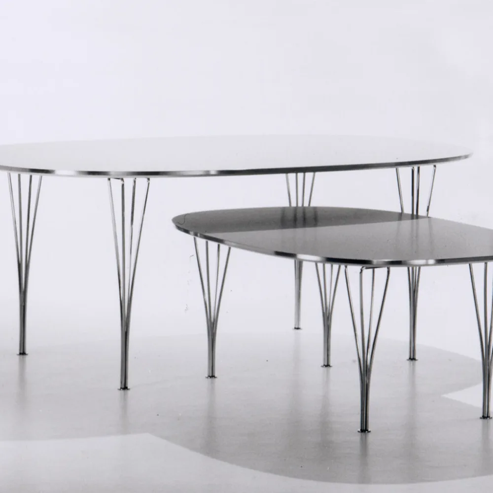 Superellips B619 matbord, Vit laminat 2 ilägg-krom  Fritz Hansen