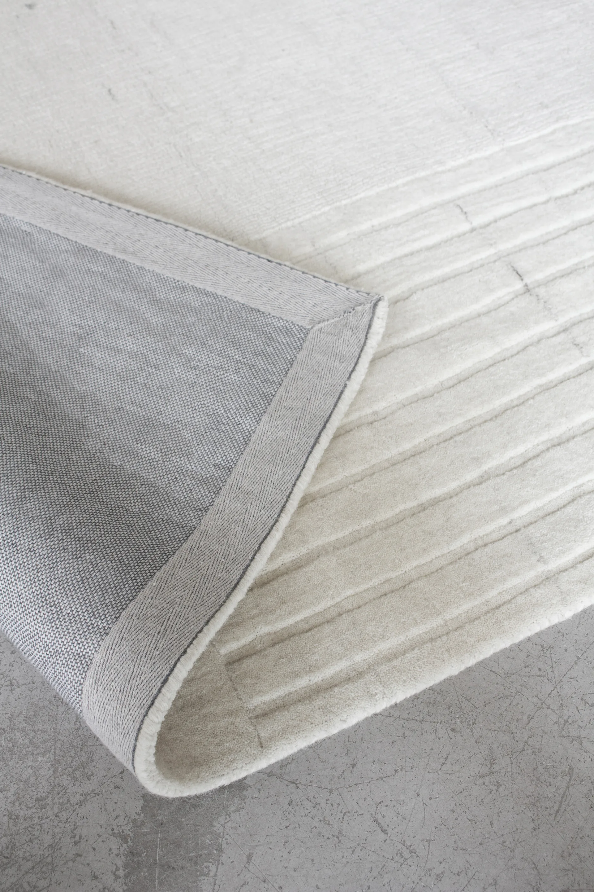 Circular ullmatta 180x270 cm, Bone white Layered