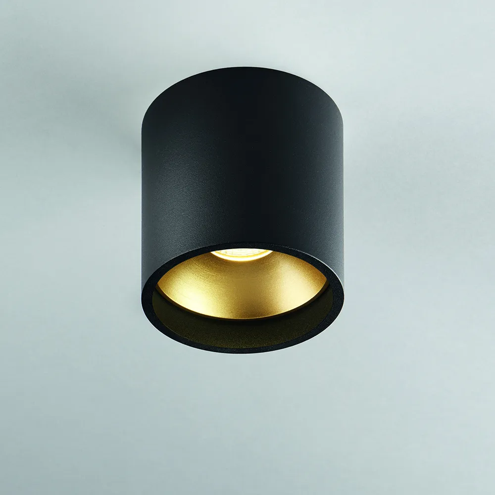 Solo Round spotlight, black/gold, 3000 kelvin Light-Point